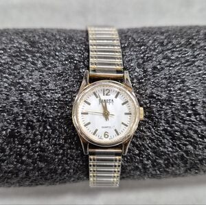 Dakota Steel Quartz watch women's small silver and gold stretch band white face